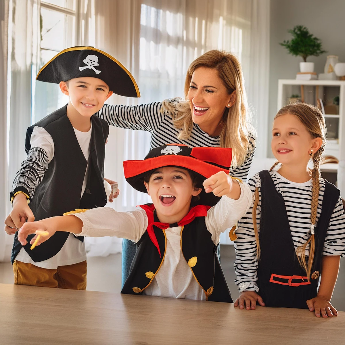 Kids and their mom are acting in their house with an acting teacher from Imagine Arts school